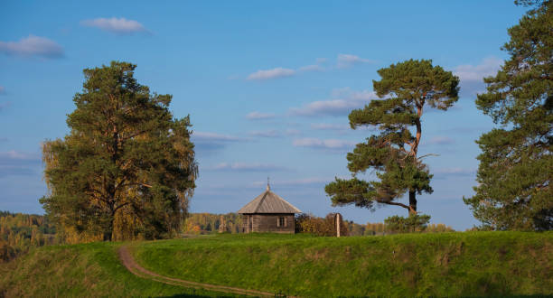 Small wooden chapel in the Pushkin Hills. Pskov region. Russia